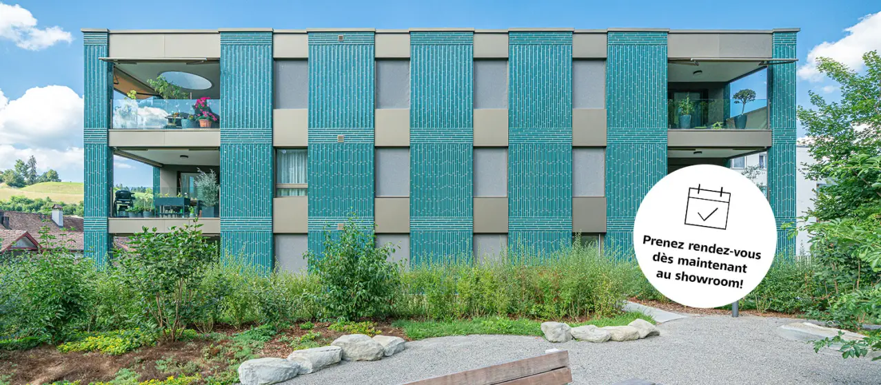 Immeuble collectif avec une façade en briques céramiques vertes