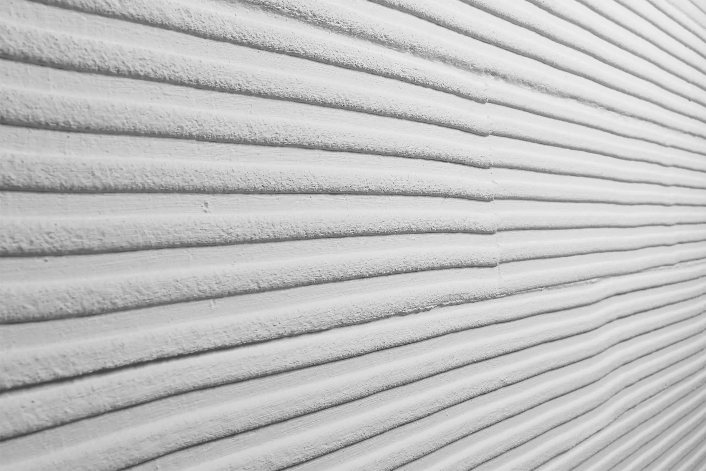 Intonaco pettinato, intonaco per facciate StoSignature texture Linear 30, superficie intonaco grezza