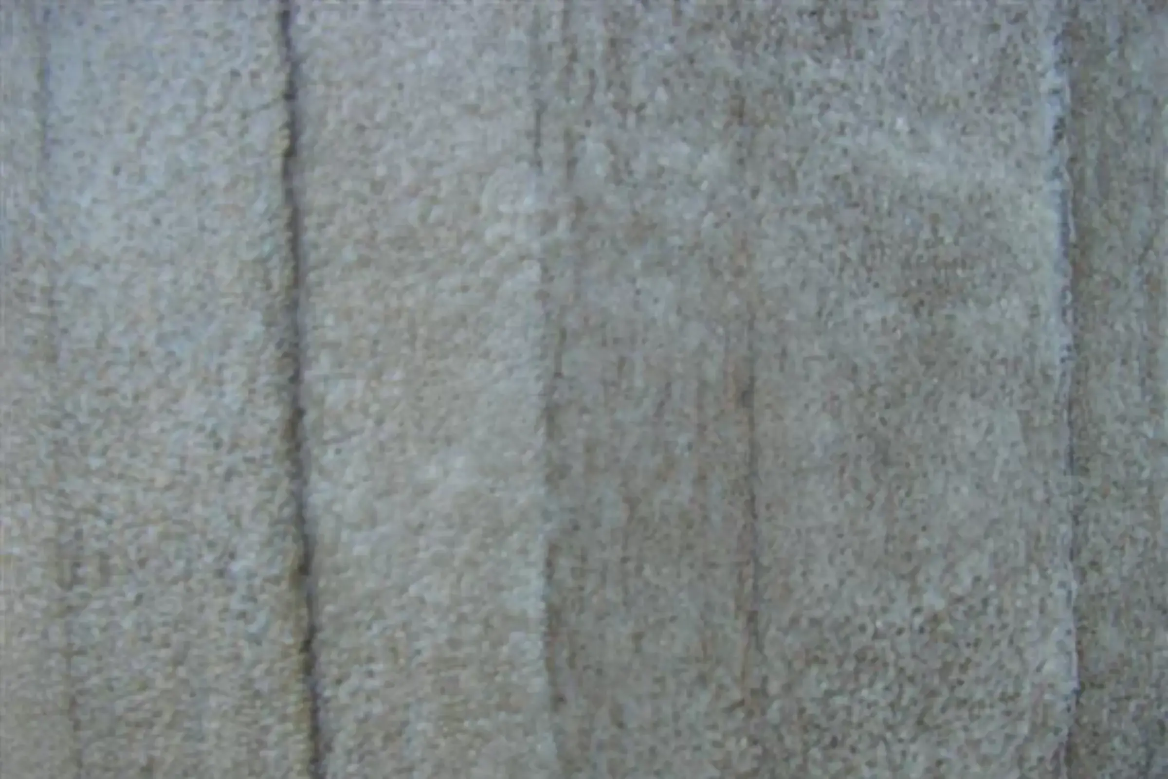 Gros plan sur un mur en béton à rénover