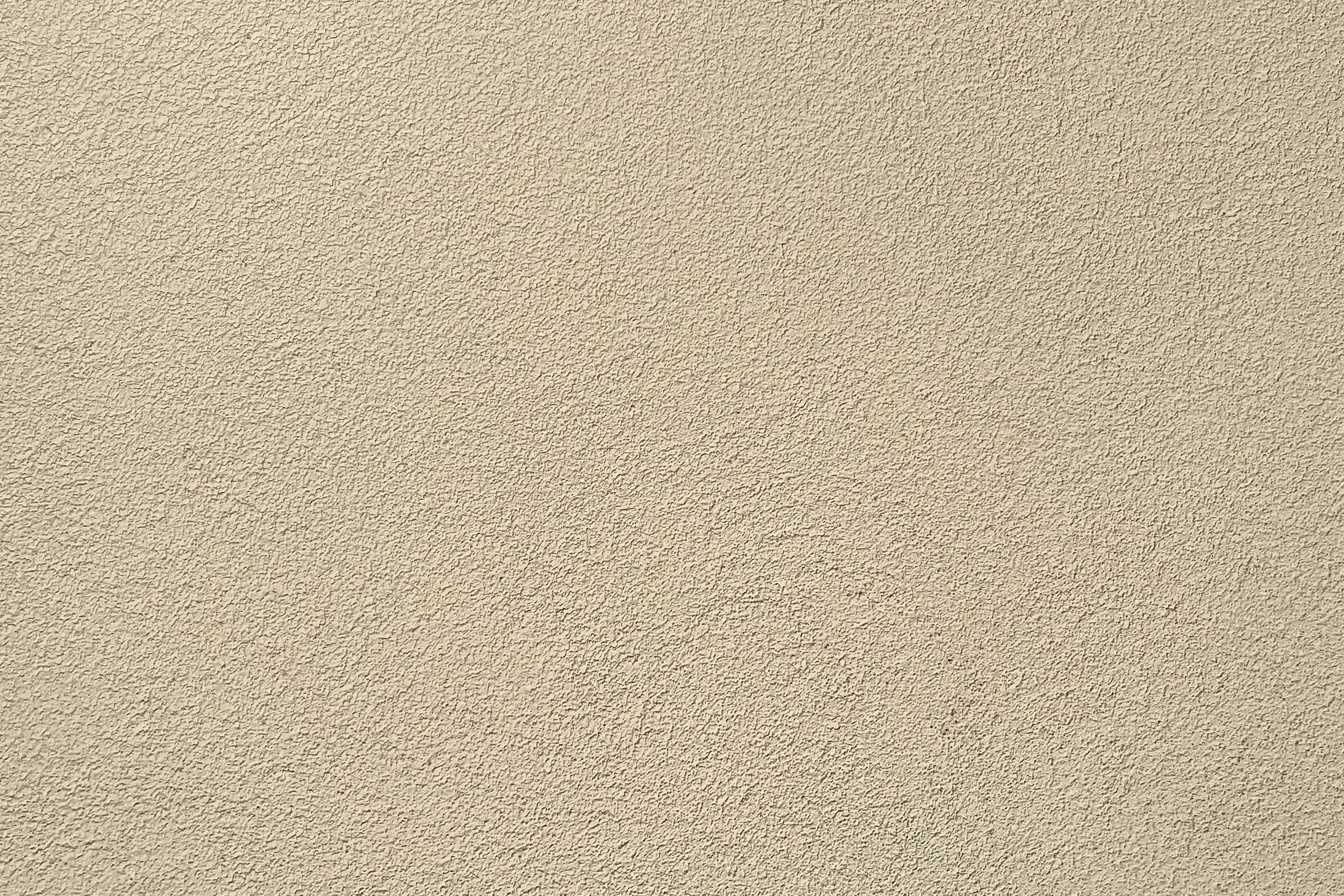 Nahaufnahme cremefarbene Putzbeschichtung