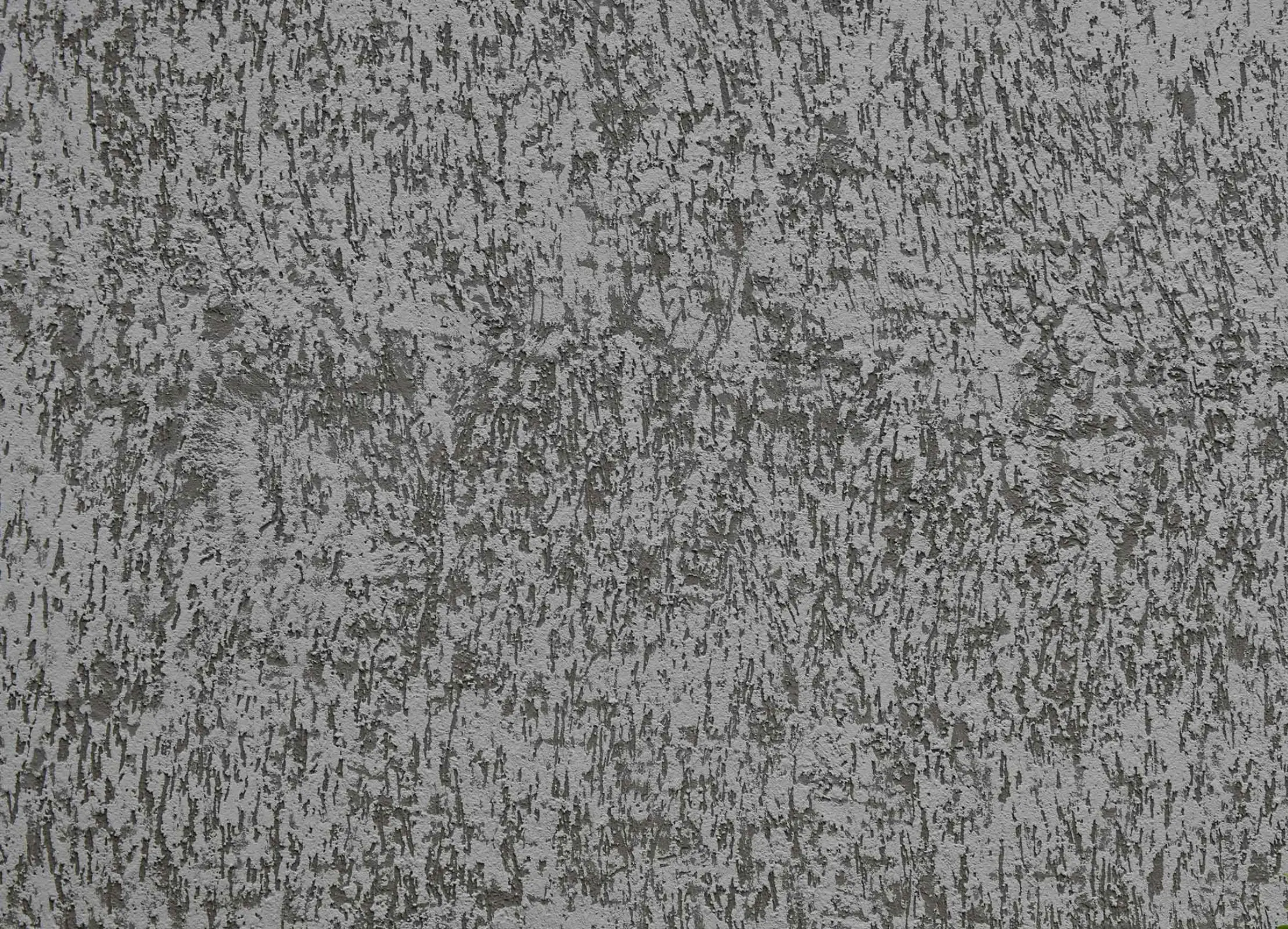 Nahaufnahme der Fassadenbeschichtung StoSignature partiell in braun und beige