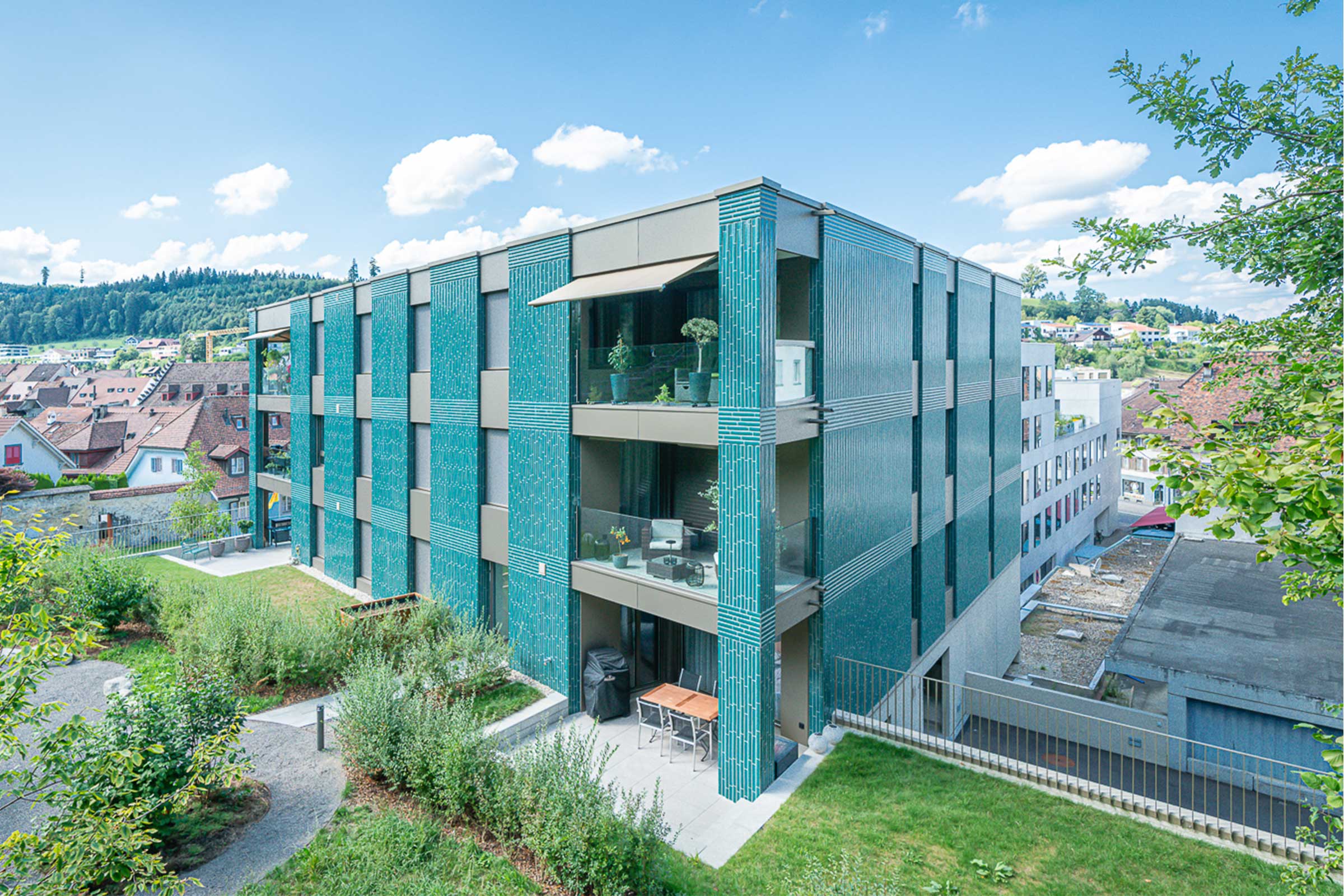 Condominio a Willisau con rivestimento di facciata StoTherm Mineral e StoCera verde