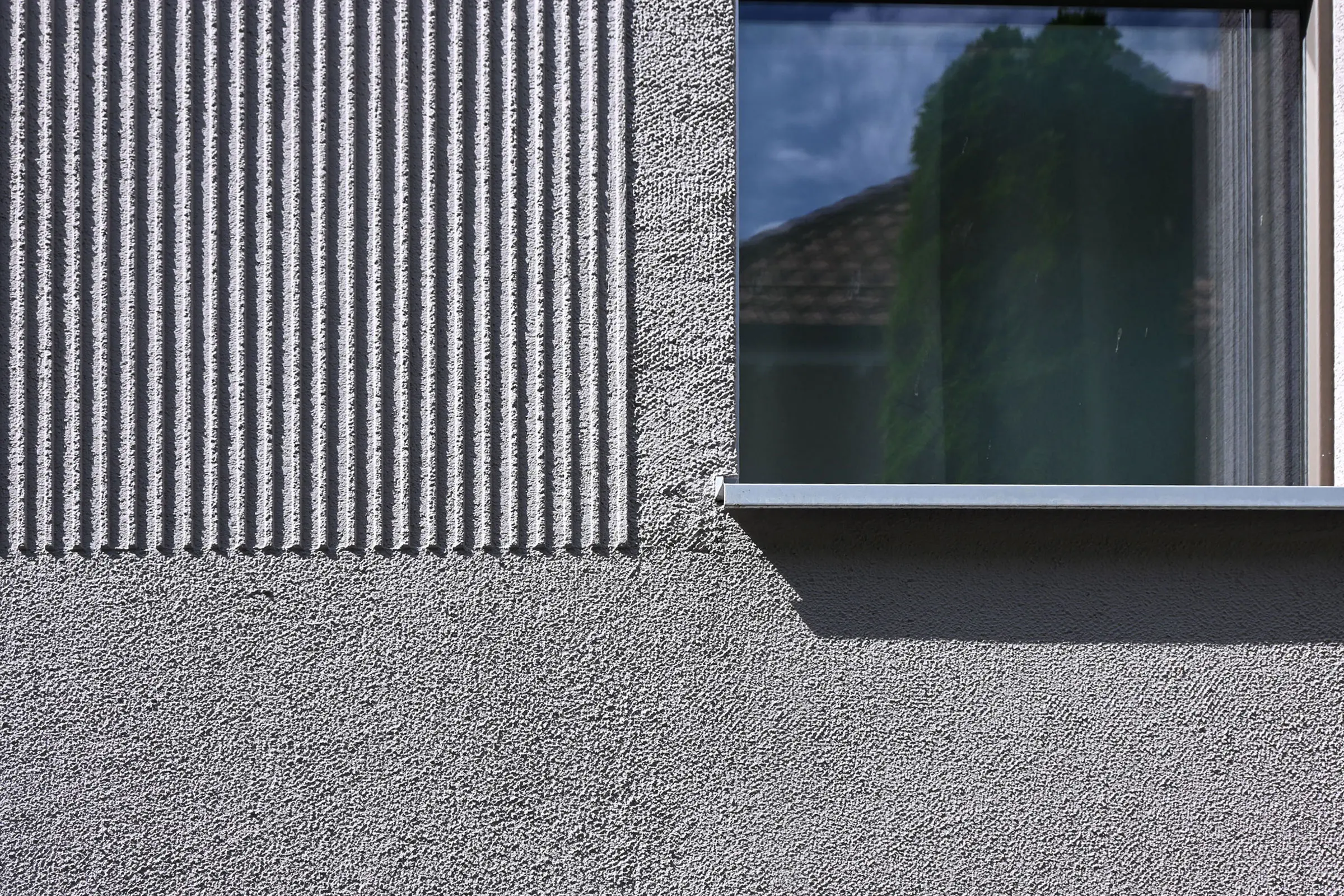 Ansicht von Fassadenausschnitt mit Fenster von MFH