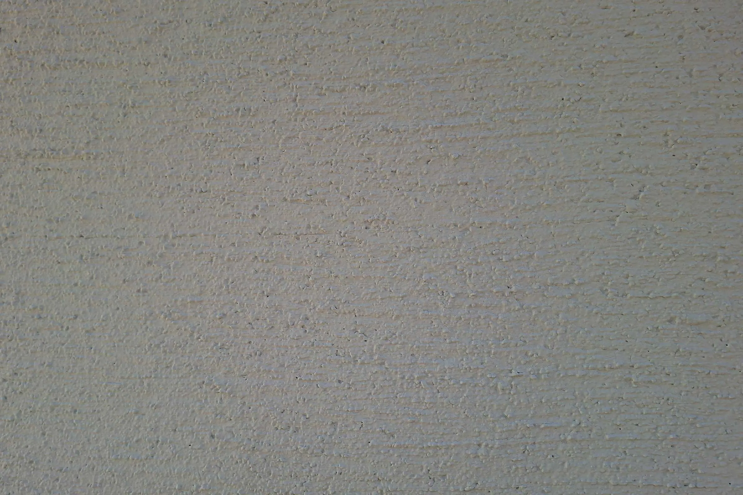 Nahaufnahme Fassadenputz StoMiral in hellem Beige