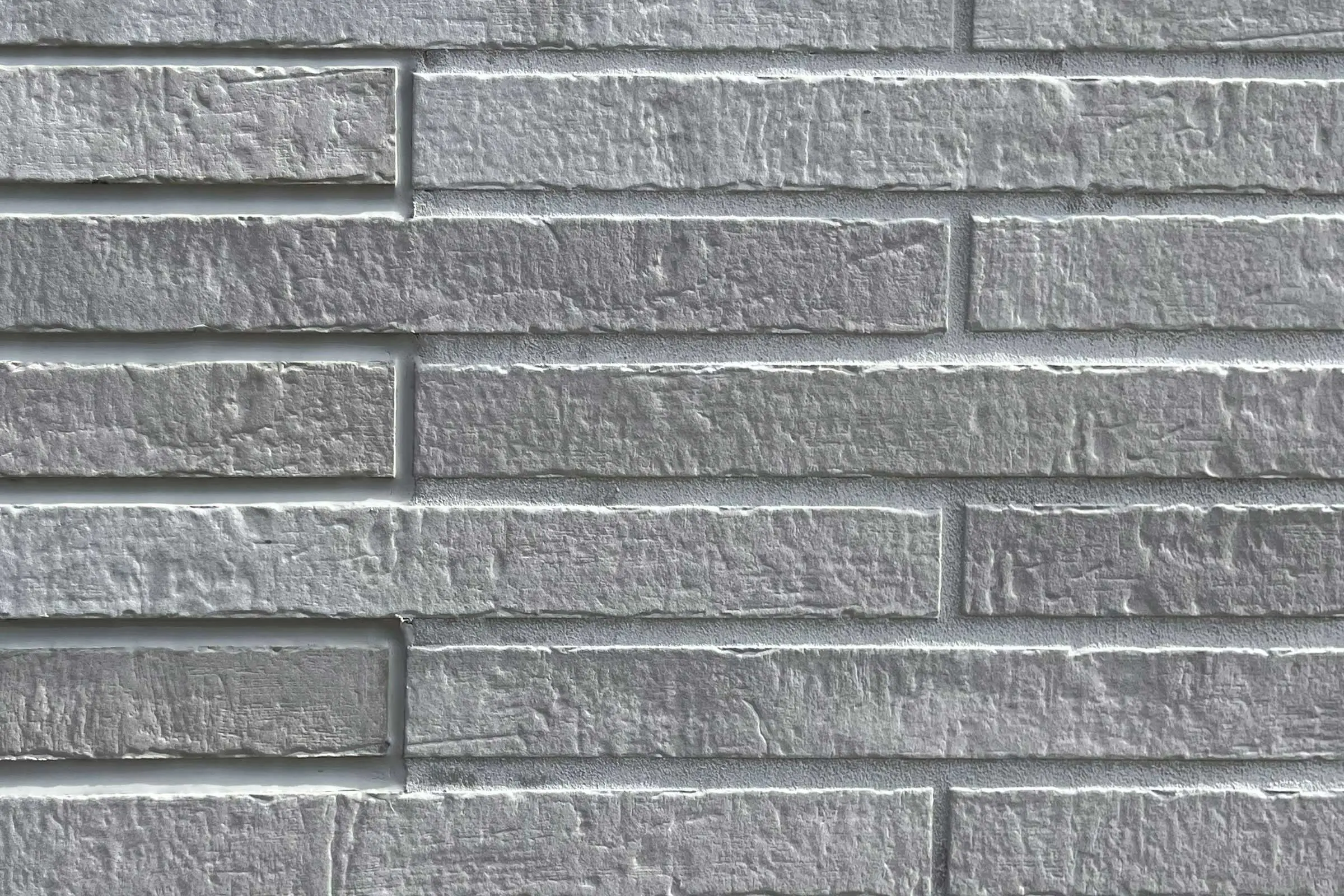 Nahaufnahme Klinkerfassade in grau-beige