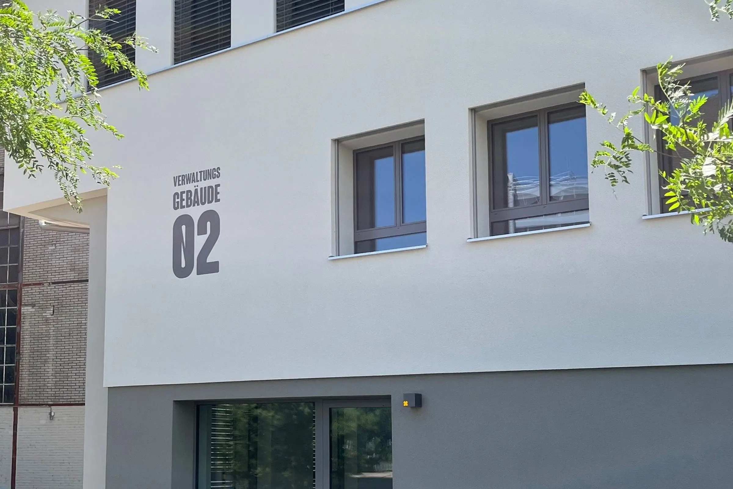 Eingangsbereich Verwaltungsgebäude SIG Neuhausen