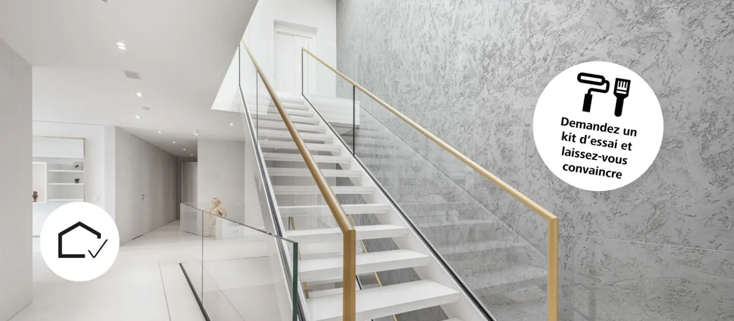 Photo d'intérieur Cage d'escalier avec l'enduit décoratif écologique StoCalce en gris